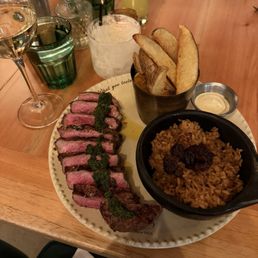 Steak with coconut rice