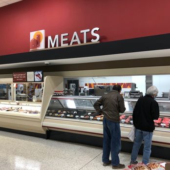 Publix - a man and a woman standing in front of a meat counter - Grocery Near Me - Alpharetta, Georgia Publix - a man and a woman standing in front of a meat counter - Grocery Near Me - Alpharetta, Georgia