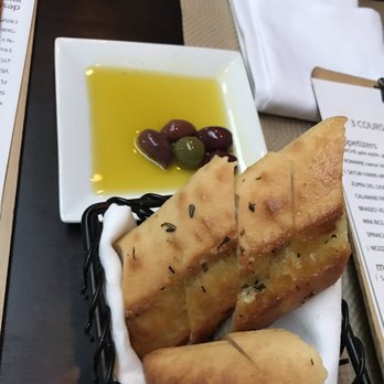 Ruvo - Complimentary Bread with Dipping Oil & Olives- great flavors, fresh bread, soaked up all of the oil & was offered seconds - Italian Near Me - Port Jefferson, New York Ruvo - Complimentary Bread with Dipping Oil & Olives- great flavors, fresh bread, soaked up all of the oil & was offered seconds - Italian Near Me - Port Jefferson, New York