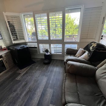 Saiki's Window Designs - Plantation shutters in our living room - Shades & Blinds Near Me