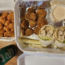 Sinkhole Saloon & Grill - grilled chicken caesar wrap - fried pickles - tater tots