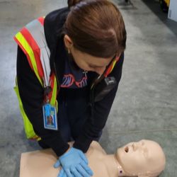 Everyday Heroes CPR - Student showing off her skills with compressions utilizing 2inches of depth and 100-120 beats per minute.
