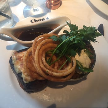Chops City Grill - Lovely presentation of my center cut filet that was crusted with blue cheese - Steakhouses Near Me - Naples, Florida