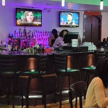 Lounge 58 - people sitting at a bar watching tvs - Lounges Near Me - Tamarac, Florida Lounge 58 - people sitting at a bar watching tvs - Lounges Near Me - Tamarac, Florida