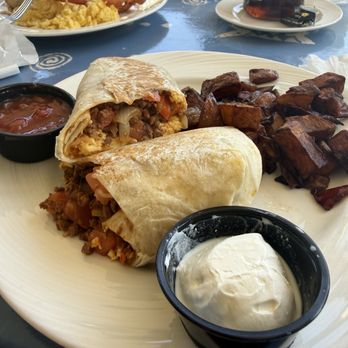 Beachside Bistro - Breakfast burrito with chorizo. Well done home fries. - New American Near Me - Kill Devil Hills, North Carolina