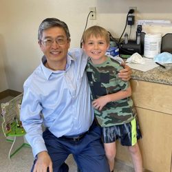 Allergy Partners of Albuquerque - Dr. Wang and my son, Caleb on the day he completed his dairy OIT program
