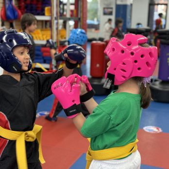 Kang's Black Belt Academy - New gold belts learning how to spar - Martial Arts Near Me - Olney, Maryland Kang's Black Belt Academy - New gold belts learning how to spar - Martial Arts Near Me - Olney, Maryland