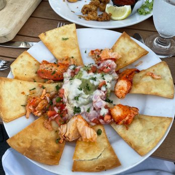 Rocks21 - Lobster nachos and calamari in the background - Seafood Near Me - Mystic, Connecticut Rocks21 - Lobster nachos and calamari in the background - Seafood Near Me - Mystic, Connecticut