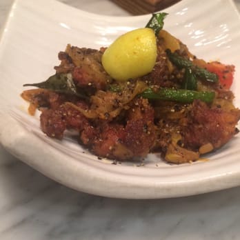 Trishna - The quail pepper fry starter. The stuff dreams are made of. Tender, crispy and perfectly complemented with fried onion. - Indian Near Me - London, XGL Trishna - The quail pepper fry starter. The stuff dreams are made of. Tender, crispy and perfectly complemented with fried onion. - Indian Near Me - London, XGL