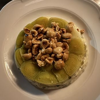 Le Crocodile - Leeks with vinaigrette and hazelnuts, sooo good - French Near Me - Brooklyn, New York
