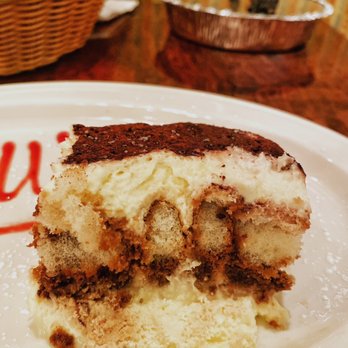 Bellini - Tiramisu -- Three layers of lady fingers soaked in coffee and liqueur, filled with zabaglione cream, topped with grated Belgium Chocolate - Italian Near Me - Philadelphia, Pennsylvania