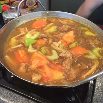 Chinese Dumpling House - Hot pot- stewed beef brisket with veggies and tomatoes and crystal noodles. - Chinese Near Me - Mississauga, Ontario Chinese Dumpling House - Hot pot- stewed beef brisket with veggies and tomatoes and crystal noodles. - Chinese Near Me - Mississauga, Ontario
