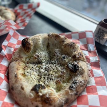 Solamente Pizza - a close up of a pizza - Pizza Near Me - Las Vegas, Nevada