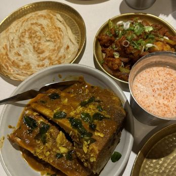 Hoppers - Bone marrow varuval and roti, and hot butter squid - Sri Lankan Near Me - Soho, XGL