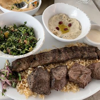 Ammatoli - Ribeye Kebab (3/5), Kafta Kebab (1/5), rice (1/5), roasted eggplant (3.5/5), tabouleh (3/5) - Mediterranean Near Me - Long Beach, California Ammatoli - Ribeye Kebab (3/5), Kafta Kebab (1/5), rice (1/5), roasted eggplant (3.5/5), tabouleh (3/5) - Mediterranean Near Me - Long Beach, California