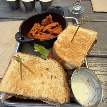 Tapped Public House - Club sandwich and sweet potato waffle fries. - Gastropubs Near Me - Camano Island, Washington Tapped Public House - Club sandwich and sweet potato waffle fries. - Gastropubs Near Me - Camano Island, Washington