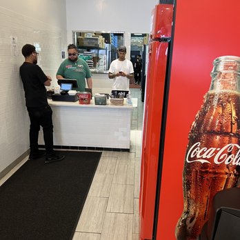 7th Street Burger Financial District - a coca cola machine in the foreground - Burgers Near Me - New York, New York 7th Street Burger Financial District - a coca cola machine in the foreground - Burgers Near Me - New York, New York