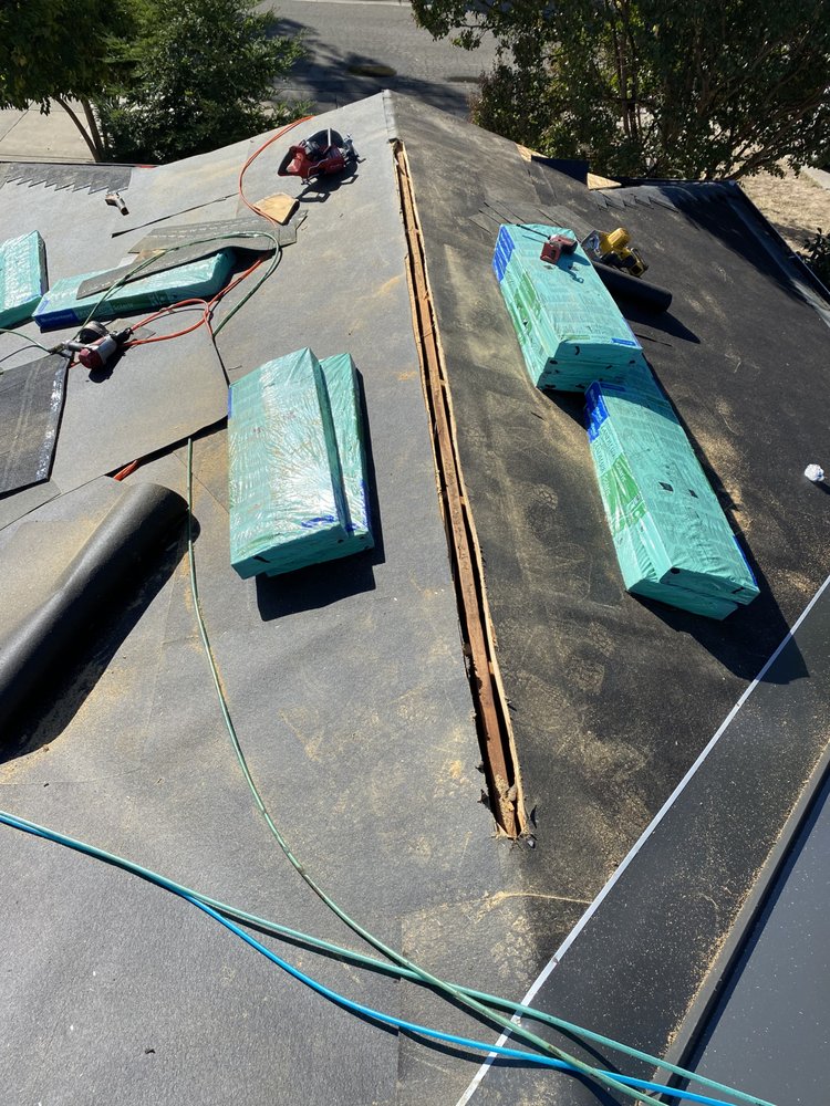 Slide of Kora Roofing