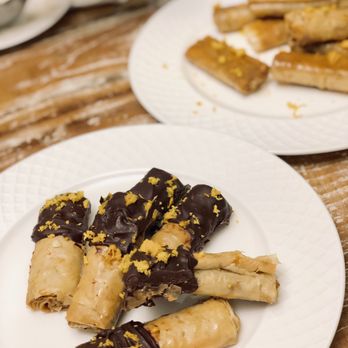 Chefan by RCB - Mediterranean X Asian; Bakllios, an original creation for the guest of honor. orange-infused honey EVOO Baklava Rolls dipped in dark choco - Personal Chefs Near Me Chefan by RCB - Mediterranean X Asian; Bakllios, an original creation for the guest of honor. orange-infused honey EVOO Baklava Rolls dipped in dark choco - Personal Chefs Near Me