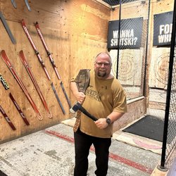 Forged Axe Throwing - My dad winning the axe throwing challenges