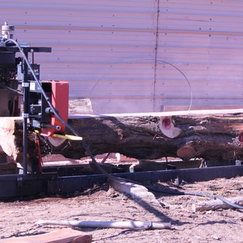 Ridge Runner Logging & Mill - Cutting a very special mantel for a customer in Arkansas. - Building Supplies Near Me - Luther, Oklahoma Ridge Runner Logging & Mill - Cutting a very special mantel for a customer in Arkansas. - Building Supplies Near Me - Luther, Oklahoma