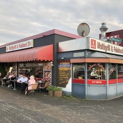 Multigrill & Feinkost - Seating inside and out at this popular neighborhood eatery.