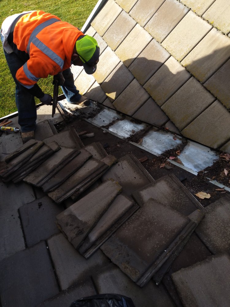 Slide of GT Roofing Services