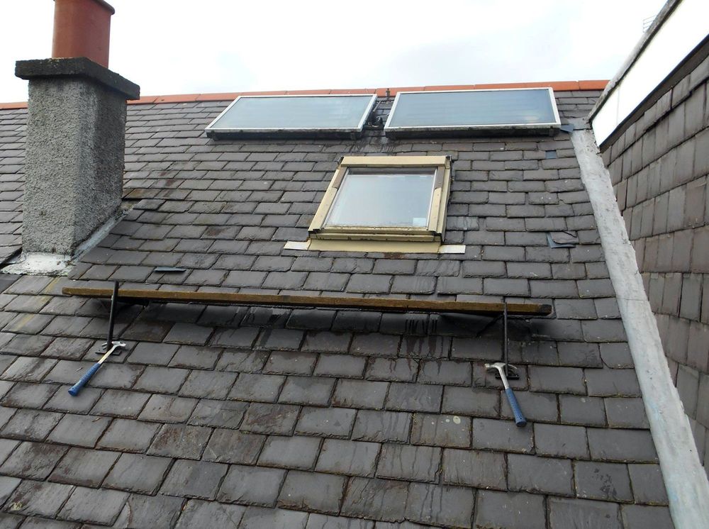 Slide of Quail Hill Roofing