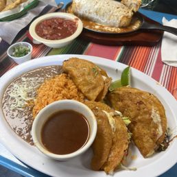 Burris taco combo and wet carne asada burrito. Burris taco combo and wet carne asada burrito.