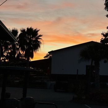 Neons Bar 72 - Sunset out in the back bar area. - Cocktail Bars Near Me - Panama City Beach, Florida Neons Bar 72 - Sunset out in the back bar area. - Cocktail Bars Near Me - Panama City Beach, Florida
