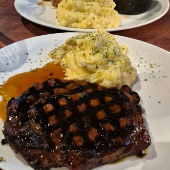 J. Alexander's - Maui steak and 12oz prime rib, both with mashed potatoes - American Near Me - Chandler, Arizona