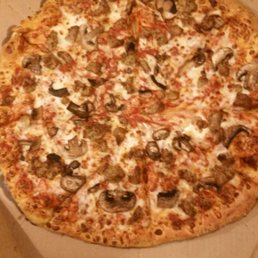 Large pie with Italian sausage and mushrooms Large pie with Italian sausage and mushrooms