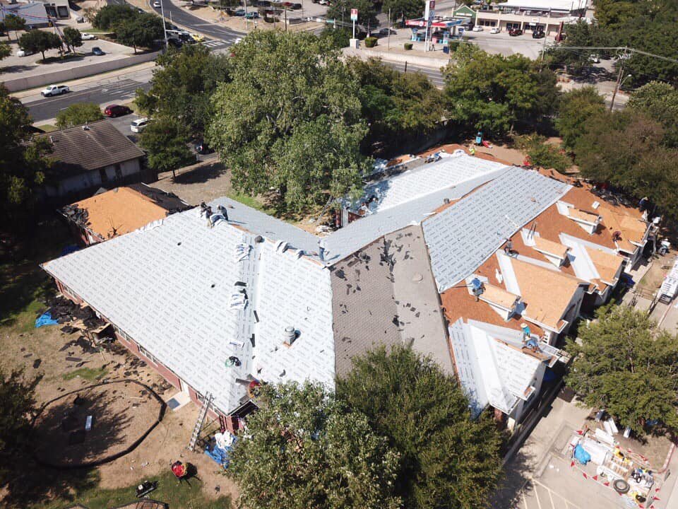 Slide of Magnolia Roofing & Restoration