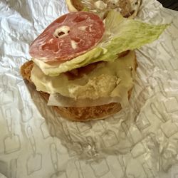 Wendy's - Cheese with the paper still in it.