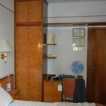 Relais Santa Chiara - Our Small Double Room (Fan is Ours, Not in Room) - Hotels Near Me - San Gimignano, SI