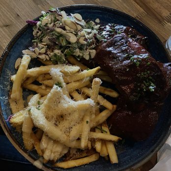 Eureka! - Barbecue Pork Ribs Truffle Cheese Fries Coleslaw - American Near Me - Berkeley, California