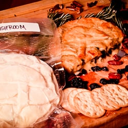 Well Done Catering - Gourmet Brie
Creamy Brie wheels topped with 20 different decadent concoctions. 
Frozen and sealed.  For Retail sale everyday!