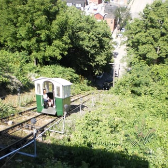 Fenelon Place Elevator Company - One goes up while the other car heads down, counter-balanced on a cable. - Elevator Services Near Me - Dubuque, Iowa