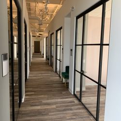 LeavittHaas - Custom designed Doors in a new salon; provides each stylist their own space to personalize while keeping the the overall salon uniform