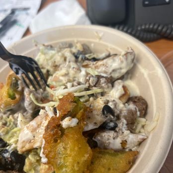 Baja Coop - a plate of food with a fork in it - Chicken Wings Near Me - Dalton, Georgia Baja Coop - a plate of food with a fork in it - Chicken Wings Near Me - Dalton, Georgia