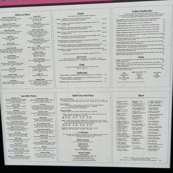 Sugar River Pizza - Menu posted outside. Not 100% current but close - Pizza Near Me - New Glarus, Wisconsin