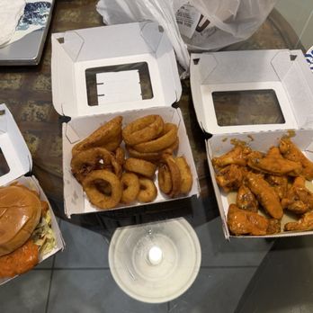 Buffalo Wild Wings - Spicy Chicken Sandwich Beer-Battered Onion Rings Bone-In Wings - Chicken Wings Near Me - Indian Harbour Beach, Florida Buffalo Wild Wings - Spicy Chicken Sandwich Beer-Battered Onion Rings Bone-In Wings - Chicken Wings Near Me - Indian Harbour Beach, Florida