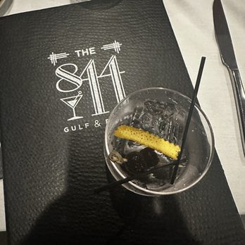 844 Gulf & Prime - smokey the bear cocktail before we poured in the liquor with smoke (ice cube literally has 844 imprinted) - Wine Bars Near Me - Marco Island, Florida 844 Gulf & Prime - smokey the bear cocktail before we poured in the liquor with smoke (ice cube literally has 844 imprinted) - Wine Bars Near Me - Marco Island, Florida