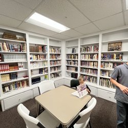 Pilgrim Orthodox Presbyterian - Checking out the library with the kiddos.