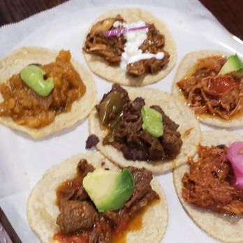 Guisados - The sampler 6tacos 2 beef, chicken  & beef too spicy for us but tje horchata helps remove the spice. - Tacos Near Me - Burbank, California