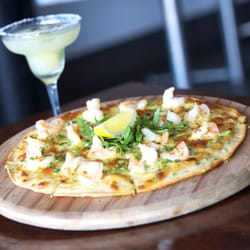 Nobbys Arc - Garlic chilli prawn pizza w bechamel sauce, mozzarella, shallots, parsley, dill & rocket
