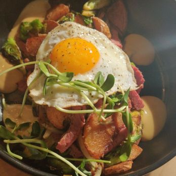 Locals Only - Chefs Choice: Corned beef hash, sunflower micros, and Sunnyside Up Egg. - Breakfast & Brunch Near Me - Rochester, New York Locals Only - Chefs Choice: Corned beef hash, sunflower micros, and Sunnyside Up Egg. - Breakfast & Brunch Near Me - Rochester, New York