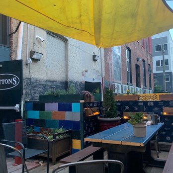 Sutton's - Back alley patio. - American Near Me - Philadelphia, Pennsylvania Sutton's - Back alley patio. - American Near Me - Philadelphia, Pennsylvania