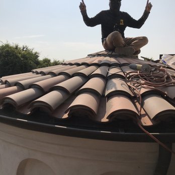 Reno's Roofing - Gabriel finished working on the round turret - Roofing Near Me - Sylmar, California