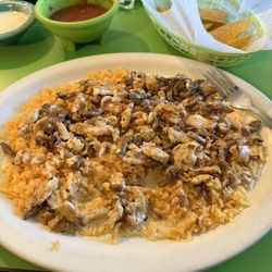 Los Sauces Mexican Restaurant - Chicken steak rice with cheese. Delicious and that salsa is probably the best I have ever had!!!